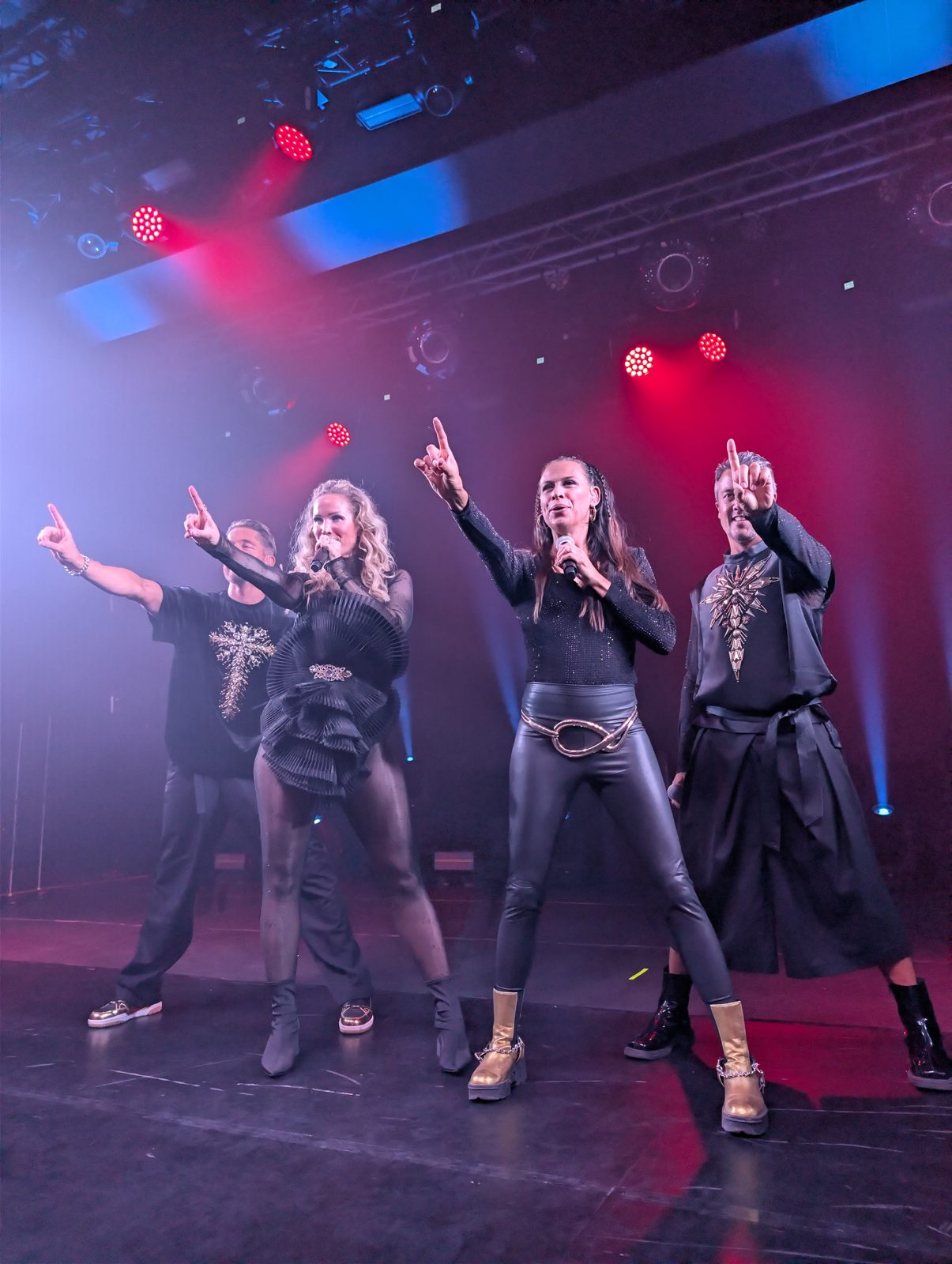 A*Teens members performing together on stage in Mexico City, 2025
